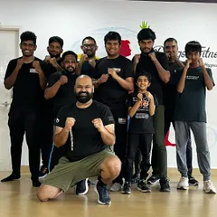 Our India Head Instructor Rhys Vaz with students after a 16-hour Practitioner Level Camp in Mangalore. We build skills and camaraderie through intensive training.