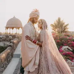 A quiet, romantic portrait captured during the golden hour against the stunning backdrop of a Rajasthan fort. We love finding these moments away from the crowds to create timeless, editorial style images for our couples.