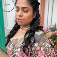 Another angle of the pre-wedding shoot makeup, highlighting the long, fluttery lashes and the glowing skin finish. The soft curls in her hair add to the romantic and dreamy quality of the look.
