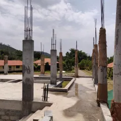 Concrete pillars stand ready on site, mapping out the future corridors and water channels that will define the holiday retreat's ground floor.