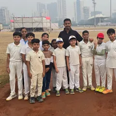 Another group of our dedicated players standing with their coach, ready to take on any challenge together.