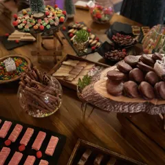 A closer look at the variety on the candy grazing table, including chocolate wafers, gems, jellies, and pie cookies.