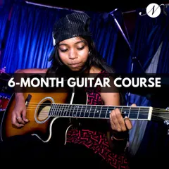 Our 6-month guitar course is designed to build a strong foundation. This student is on her journey to mastering the instrument through our comprehensive Music Method program.