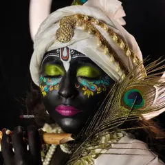 Makeup is my art. For this look, I channeled divine energy to create a fantasy Krishna-inspired transformation, using intricate details and colors to tell a story. This is for when you want to make a truly unforgettable statement.