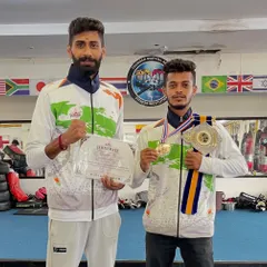 My focus is simple: my student becomes the champ. Here is my fighter with his title belt and gold medal from the 7th International Thai Martial Arts competition in Bangkok. This is the result of our hard work.