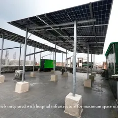 For the Jivaasha Neo Hospital rooftop, we designed and installed an elevated solar structure. This approach maximizes power generation without sacrificing valuable rooftop space, a common challenge for commercial buildings.