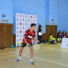 A junior player in ready position during a match at the MCA Intra-Academy tournament. We focus on creating competitive opportunities for players at all levels of their training.