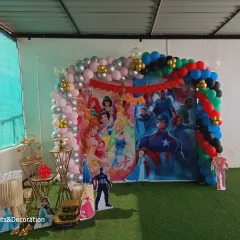 A full view of the themed backdrop and balloon decoration. I ensure the setup is balanced and vibrant, perfect for creating a festive atmosphere at a corporate family event.
