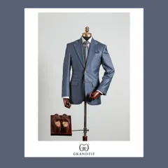 A beautifully crafted light blue suit, demonstrating a softer approach to formalwear. The subtle sheen of the fabric makes it ideal for special occasions.