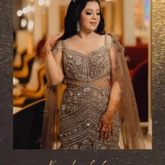 A solo portrait of the bride looking radiant in her embellished gown. We take the time to capture individual shots that showcase the bride's style and elegance during her evening celebration.
