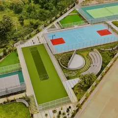 A vibrant sports and recreation zone at the Serene Exotica villa development. Our master plans seamlessly integrate active living amenities like cricket pitches, basketball courts, and amphitheaters into the landscape, fostering a strong sense of community and wellness.