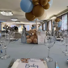 The guest tables were decorated with matching teddy bear centerpieces, custom activity books, and menus, ensuring the theme was carried throughout the entire venue.