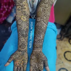 This full arm design shows a mix of styles, with bold floral patterns on one arm and more traditional, geometric work on the other. My smooth paste makes it easy to create both thick and thin lines.