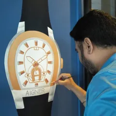 A closer look at the intricate brushwork on the Aigner watch mural. Precision is key in commercial art, and I take great care to ensure every detail is perfectly captured in my paintings.