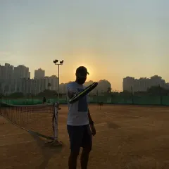 The court at sunset after a long day of coaching and practice. My passion for tennis means I am always working to excel at what I do, both for myself and for my students.