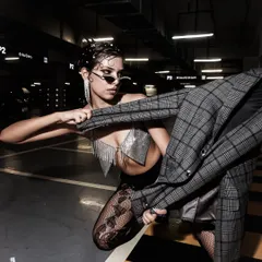 A slightly different angle of the same pose, showing how small adjustments can change the energy of the shot.