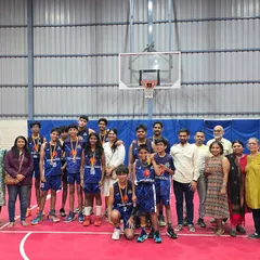The Mavericks team posing with their families after securing the runner-up position in Season 2.