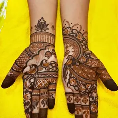 A more intricate design for Raksha Bandhan, with peacocks and lotus flowers. This is perfect for someone who wants a fuller look for the festival.