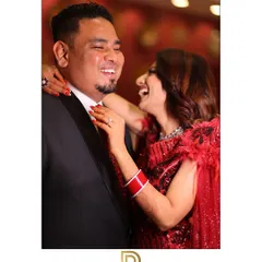 Pure, infectious laughter between a couple during their reception. These are the moments of unrestrained joy that I strive to capture to make your wedding album feel alive.