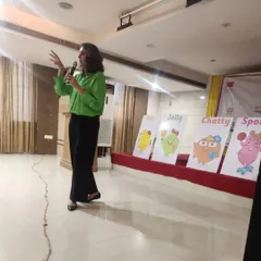 Here I am demonstrating a playful learning technique to a large group of teachers in Hyderabad. I use simple props and storytelling to show how to capture children's attention and make learning concepts memorable and fun.