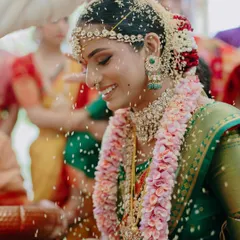 The pure joy of a wedding ceremony. This candid moment captures my South Indian bride, Meghna, during her Mahuratham in Coorg. Her makeup was designed to be luminous and long-lasting, with defined eyes that sparkle with happiness, even through the most emotional rituals.