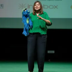 Sharing the stage with my puppet during a motivational talk. This combination of speaking and entertainment is what makes my sessions stand out at corporate functions and offsites.