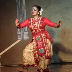 A performance of Odissi, a classical dance form known for its fluid torso movements and sculptural poses. We facilitate learning for such specialized dance forms through our network of expert gurus.
