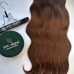 This ear-to-ear clip-in weft in a wavy texture is perfect for adding significant volume and body. It comes with a convenient hanger for easy storage, keeping your extensions in perfect shape.