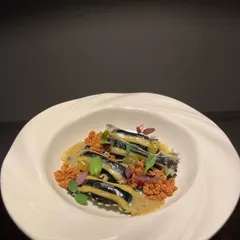 The finished dish: Agnolotti di Patate with a saffron seaweed butter sauce and a sprinkle of malt milk crumble for texture. A signature pasta dish on my tasting menus.