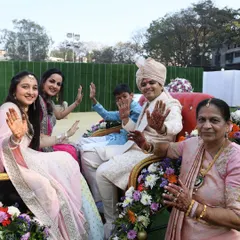 The groom's family enjoying a festive ride during the wedding celebrations. We make sure the entire family is part of the fun.