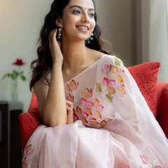 A candid, smiling portrait in the floral saree. This captures the effortless charm I aim for when styling modern ethnic wear.