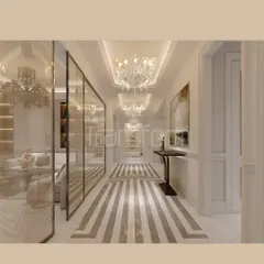 This foyer is a passage through rhythm and reflection. Bold marble lines on the floor lead the eye, while crystal chandeliers dance with light. The glass partitions create a harmony between transparency and structure.