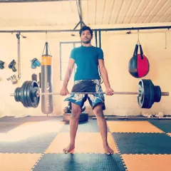 Strength training is a core part of my routine. Here I am doing deadlifts, a key exercise for building the posterior chain strength needed for explosive power.