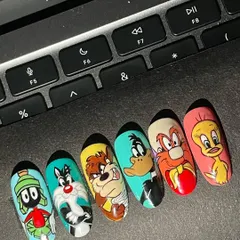 That's all, folks! A full set of Looney Tunes nails, bringing all the chaotic energy of my childhood Saturday mornings. I hand-painted everyone from Marvin the Martian and Sylvester to the Tasmanian Devil and Tweety Bird.