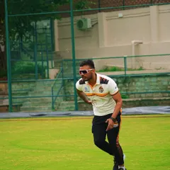 On the field, coaching athletes on movement mechanics. Proper running form and body control are fundamental skills that reduce injury risk and improve efficiency.