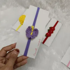 This nylon headband features a delicate purple and yellow crochet butterfly. The bands I use are very soft and stretchy, making them ideal for newborns and infants.