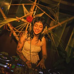 Finding my groove at a gig with some beautiful, earthy decor. The venue's vibe always adds a special layer to the music.