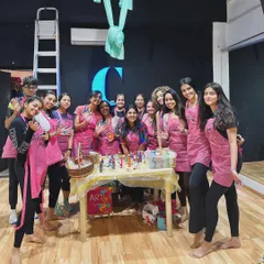 A group photo from my fluid art and aerial yoga collaboration workshop. It was a full house, with people from all walks of life coming together to try something new.