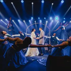 We use formations to create beautiful, cinematic frames. Here, our dancers form a circle around the couple, drawing all the attention to their romantic moment under the spotlights.