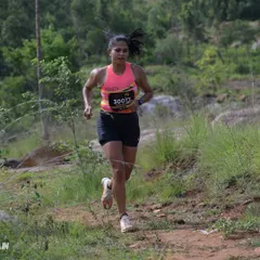 Pushing through a tough trail run at the BMF Ultra. This race tested my limits with a misbehaving hamstring and blisters, but mental grit gets you to the finish line. I coach athletes to develop this same resilience.
