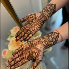 The front-hand view of the swan design, with the client's name "Utsav" beautifully written on the wrist.
