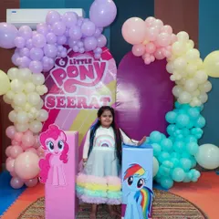 Seerat looks absolutely radiant at her "My Little Pony" themed party. The custom backdrop and her rainbow dress perfectly capture the colorful and joyful spirit of the celebration.