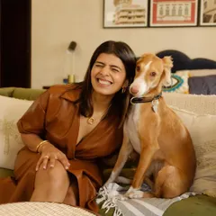 This is me with Steffi, our beloved indie dog and office mascot. My journey started in my family's 130-year-old business, and my love for design is deeply rooted in that history.