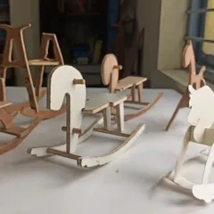 A collection of miniature rocking horse models. I use these to help students choose a design before they start building a full-sized one for their child.