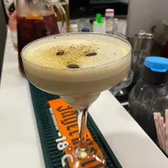 A beautifully crafted Espresso Martini with a rich, frothy top. We specialize in creating premium cocktails that taste as good as they look, perfect for any celebration.