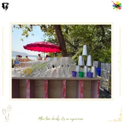 A beautiful bar setup for a brunch party, with glassware and drinks ready for a sunny celebration.