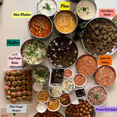 A closer look at the delicious spread for a birthday party of over 100 guests. I prepared a variety of main courses, salads, and desserts to ensure a memorable feast.