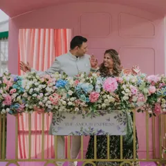 The happy couple enjoying their custom-made 'Jab We Met' installation. Seeing their story come to life is what makes our work so rewarding.