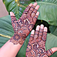 This semi bridal design is bold and beautiful. The patterns are dense on the hand and create a lovely cuff at the wrist, leaving some open space on the arm.