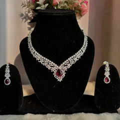 I believe every woman deserves new jewellery. This stunning American Diamond necklace with a central ruby-red stone is a perfect piece to treat yourself with.